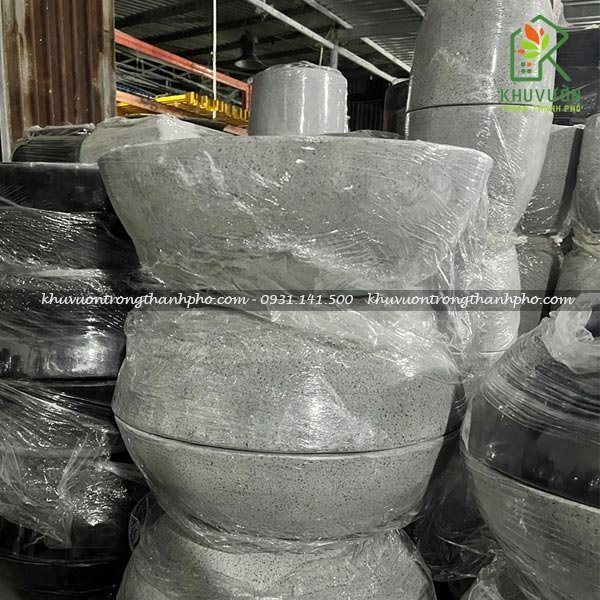 Chậu xi măng đá mài chảo trồng sen súng